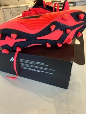adidas Neon Pink Soccer Cleats with Black Sole